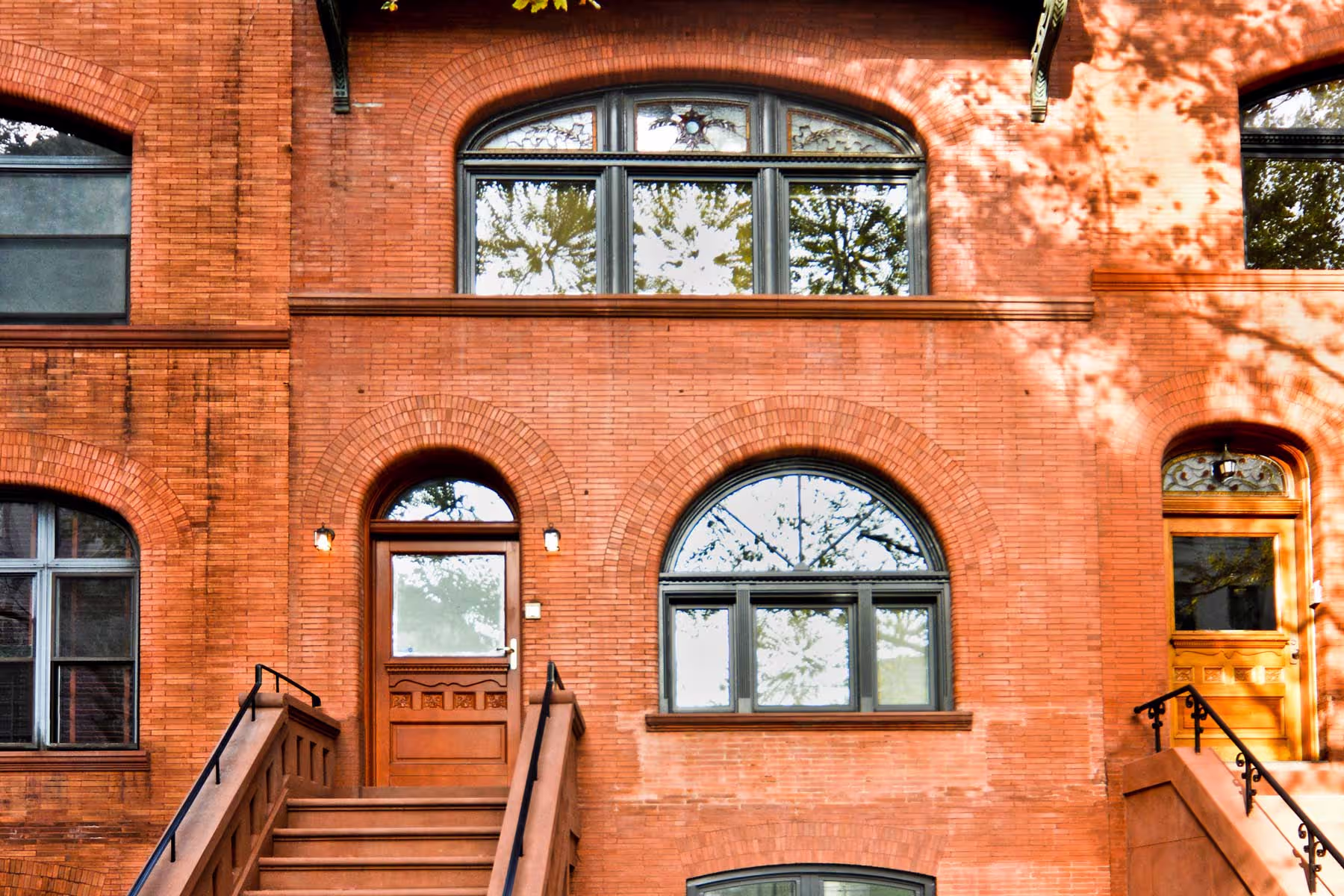 Zola reproduction door on a brownstone facade
